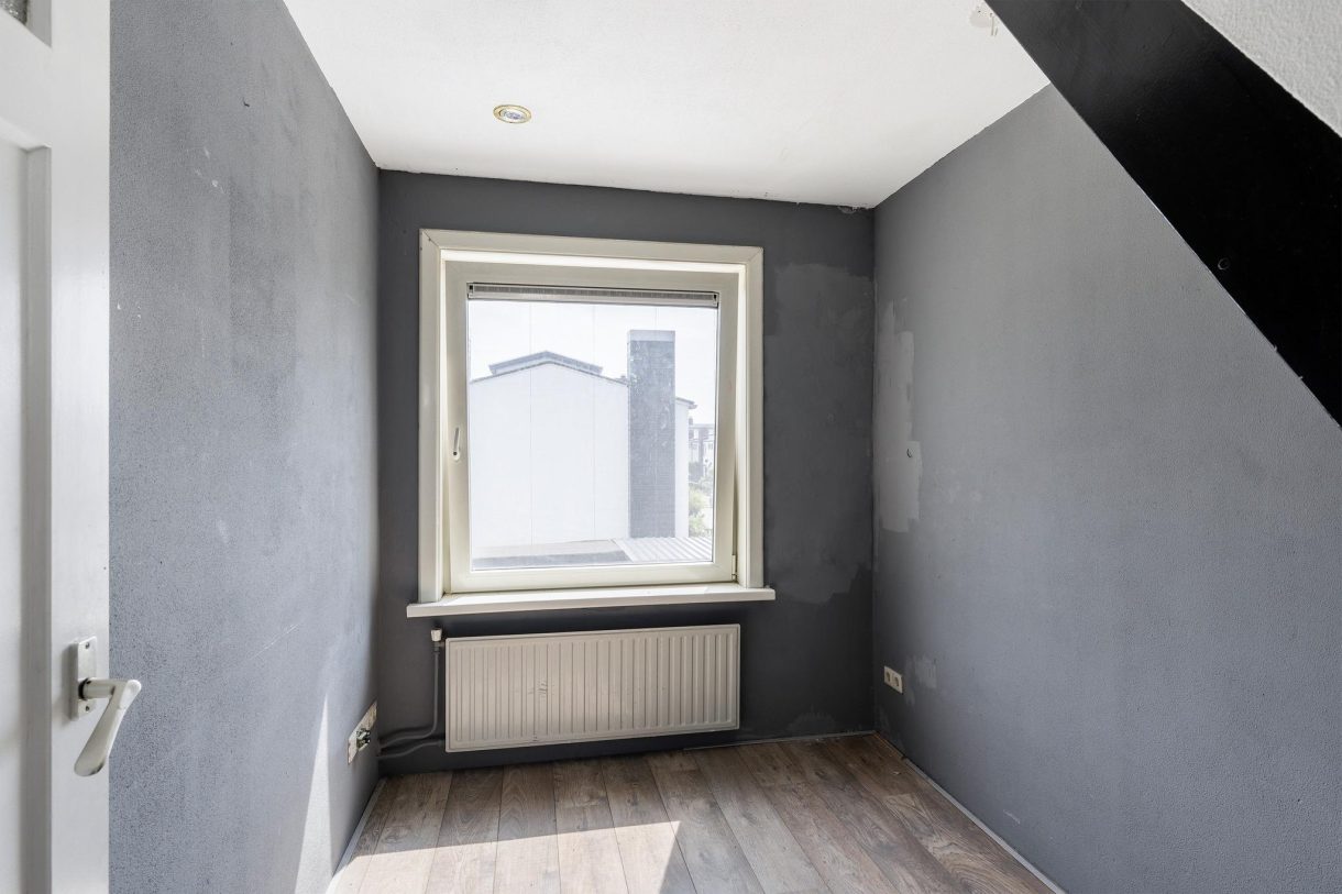 Te koop: Foto Woonhuis aan de Menadostraat 13 in Vlaardingen